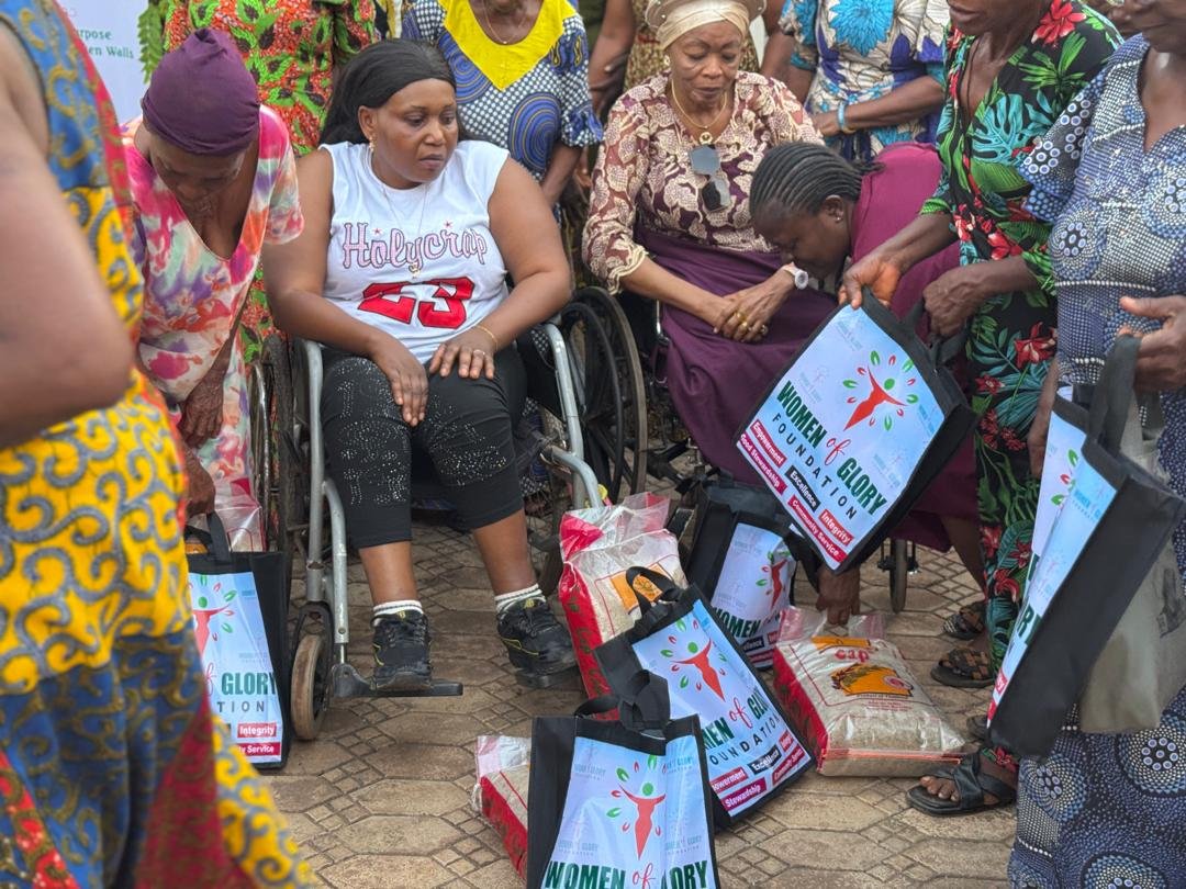 Happy African woman beneficiary smiling after receiving support